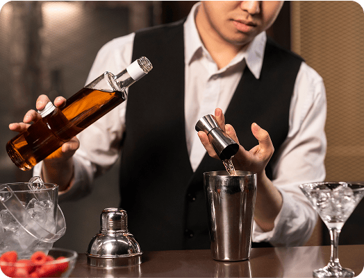 Bartender preparing drinks