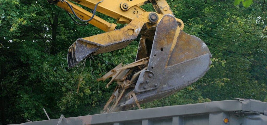 Bulldozer dumping debris
