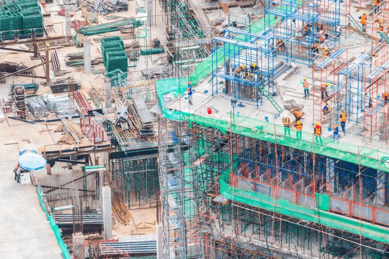 Commercial construction site illustrating workplace injury and workers' compensation risk exposure